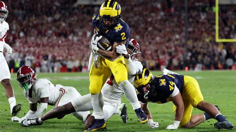 Michigan beats Alabama 27-20 in overtime on Blake Corum’s TD run to reach national title game