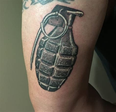 Grenade tattoo on back of arm. @paultattoos #Tattoosonback | Grenade tattoo, Tattoos, Back tattoo