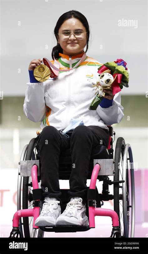 India's Avani Lekhara poses with her gold medal for the women's SH1 10-meter air rifle standing ...