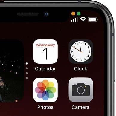 New Orange / Green Dot Indicator In iPhone Status Bar (iOS 14)