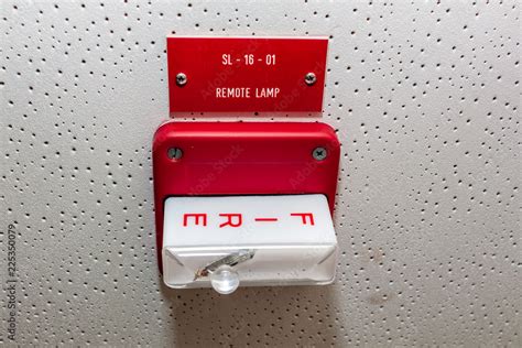 Red Fire alarm switch on the wall next to the door,Fire alarm switch ...