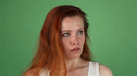 Studio Portrait Of Young Red Haired Woman Stock Footage SBV-324485116 - Storyblocks