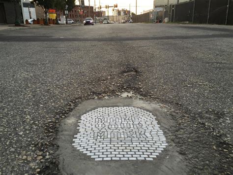 Rose - Street art: Jim Bachor's pothole mosaics - Pictures - CBS News