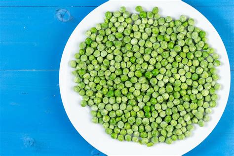 Cooked Integral Rice with Green Peas in the frying pan - Creative Commons Bilder