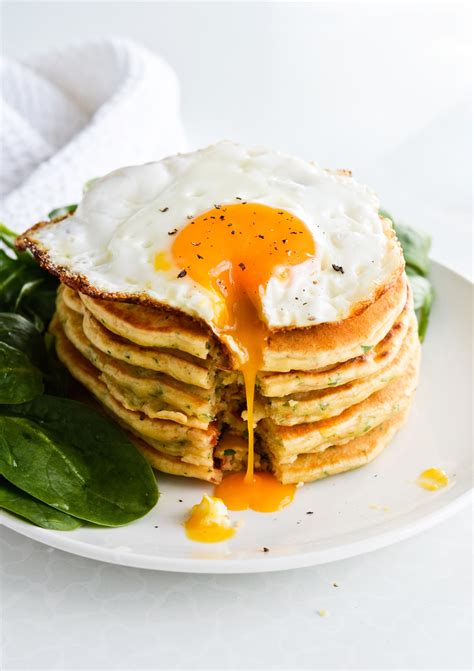 Savory pancakes with a fried egg and spinach