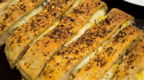 Cheesy Garlic Bread Sticks Recipe / Stuffed Garlic Bread Sticks - Recipe Flow