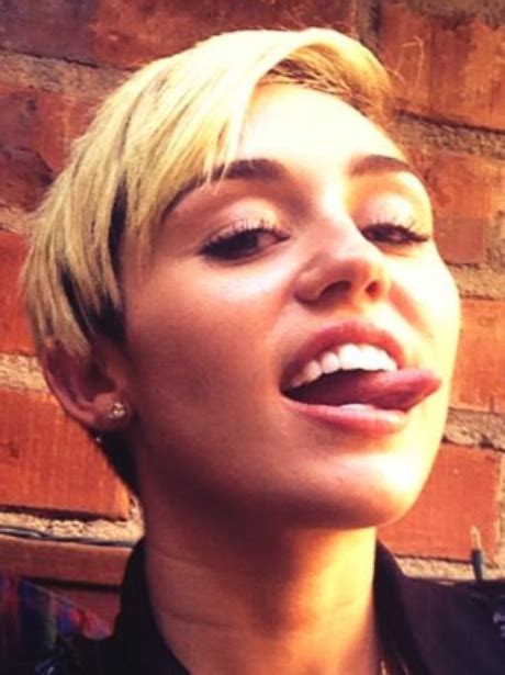 Miley Cyrus Faces: 30 Pictures Of Miley Sticking Her Tongue Out - Capital