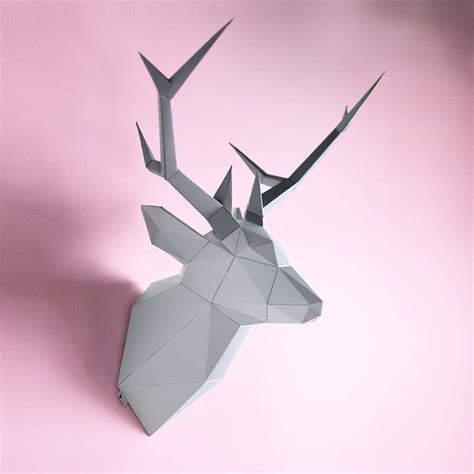 This DIY origami deer head art you can hang on your wall to proudly ...