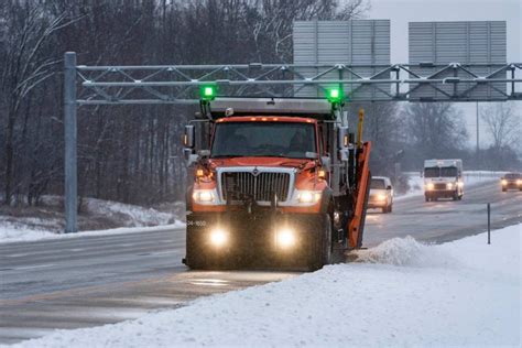 Green Warning Lights Enhance Plow Truck Visibility in Michigan - Clear Roads