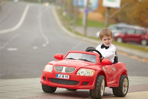 Little boy driving car | Little boy driving car — Stock Photo ...