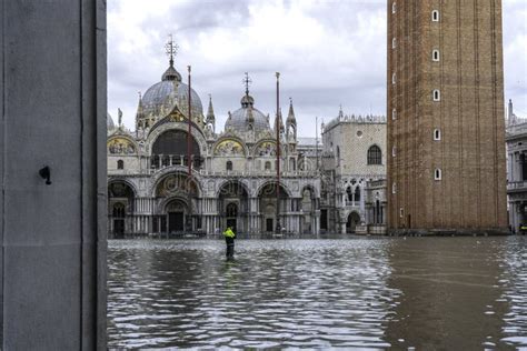 VENICE, ITALY - November 17, 2017: St. Marks Square Piazza San Marco during Flood Acqua Alta in ...