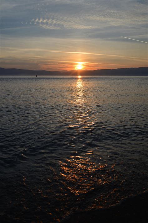 Sunset At Lake Ohrid In North Macedonia Photograph by Elena ZapasskyBaal | Fine Art America