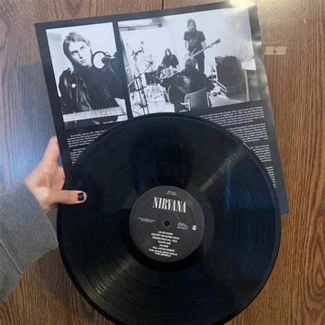 Nirvana black vinyl, played smoothly once then used... - Depop