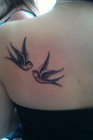 Two lovely bird tattoo on shoulder