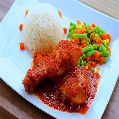 Rice and Chicken stew by Dooneys Kitchen | Stew chicken recipe, Stew recipes, Nigeria food