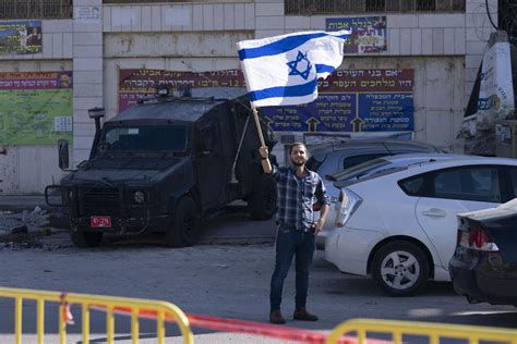 Israeli peace activists show presence in West Bank hot spot