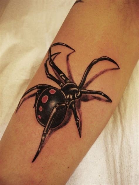 Black spider tattoo on arm | Tatouage araignée, Photo tatouage, Tatouage black widow