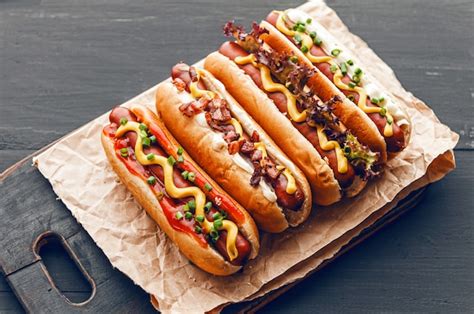 Premium Photo | Barbecue grilled hot dogs with yellow american mustard