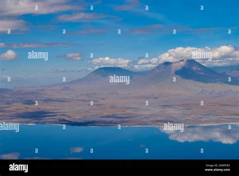 Mount Keremasi and the volcano Oldoinyo Lengai (aerial view from Lake ...