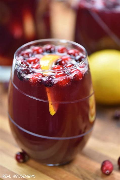 Holiday Sangria is a sweet wine cocktail loaded with fruit and juices ...