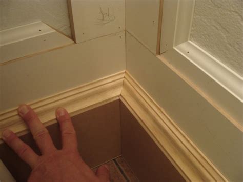 Half Bathroom Renovation: Installing the Baseboard Cap Molding - The Joy of Moldings