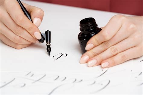 Free Photo | Girl writing calligraphy on postcards. art design.