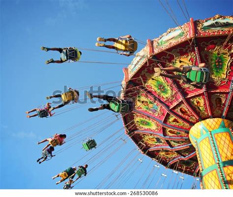 Swing Ride Fair Spinning Around People Stock Photo (Edit Now) 268530086