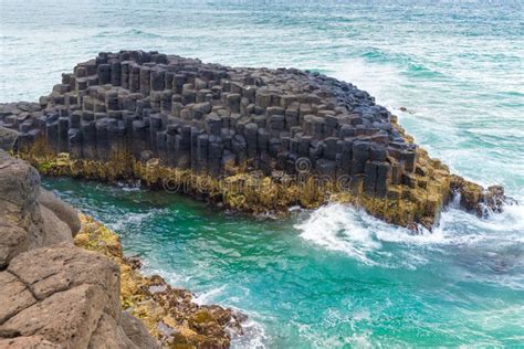 Crescent Shaped Hexagonal Rock Formations Stock Photo - Image of australia, view: 108440594