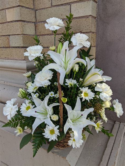 Serene White Lily Basket in Stanley, WI | Ele's Flowers