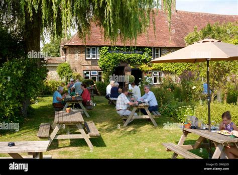 An English country pub and its beer garden, The Cricketers Arms at ...