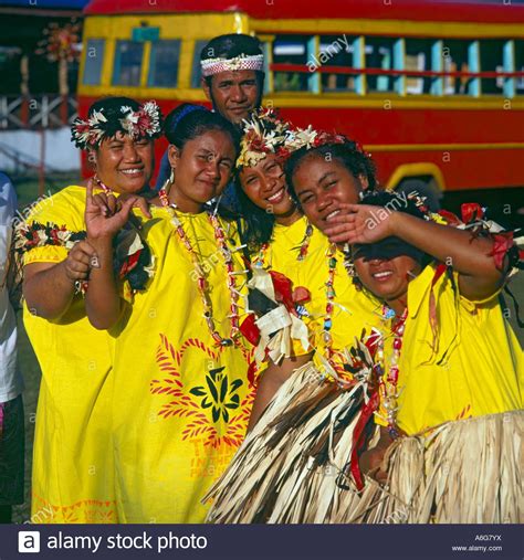 Stock Photo - 5 happy girl dancers and a man all from Tuvalu in the South Pacific pose for the ...