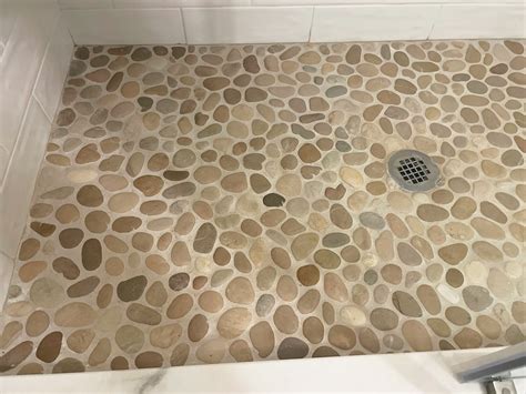 How to Grout Natural Stone Pebble Shower Floors | Remodeling