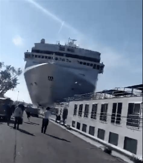 Cruise Ship Slams Into Dock As Tourists Flee [VIDEO]