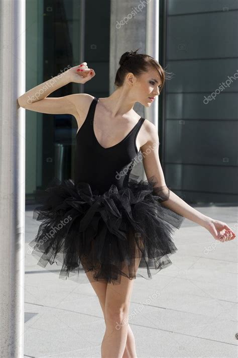 Ballerina in black tutu dancing — Stock Photo © carlodapino #6708366