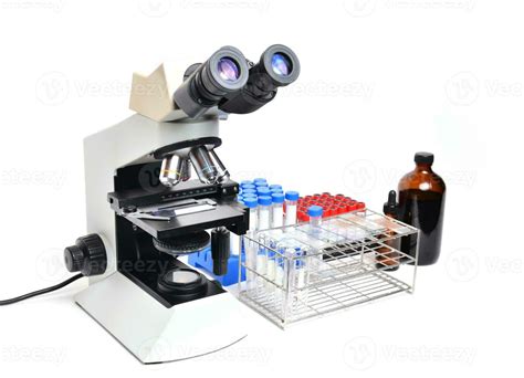 microscope with laboratory equipment 25009846 Stock Photo at Vecteezy