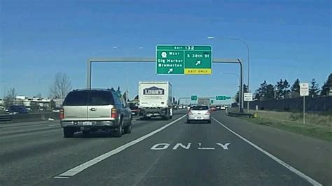 Can I cross a solid white line when changing lanes on the freeway? | Tacoma News Tribune