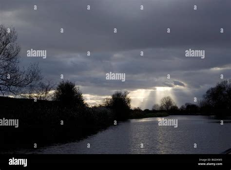 Rays of light on the river Stock Photo - Alamy