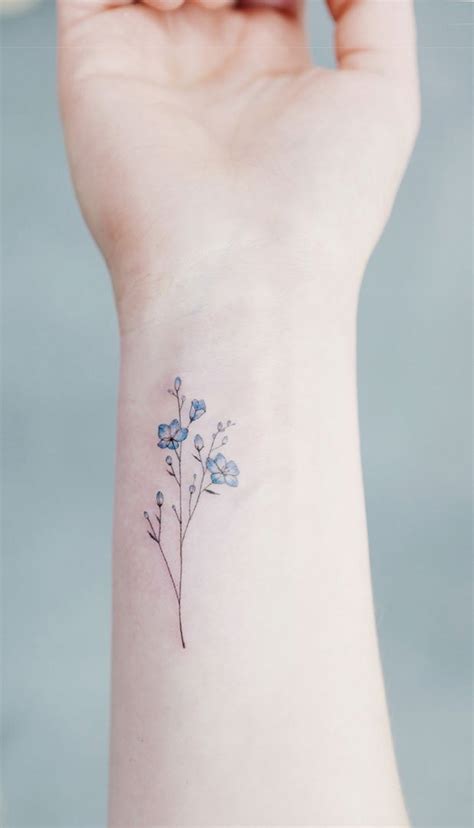 Small Tattoo | Simple flower tattoo, Classy tattoos, Flower wrist tattoos