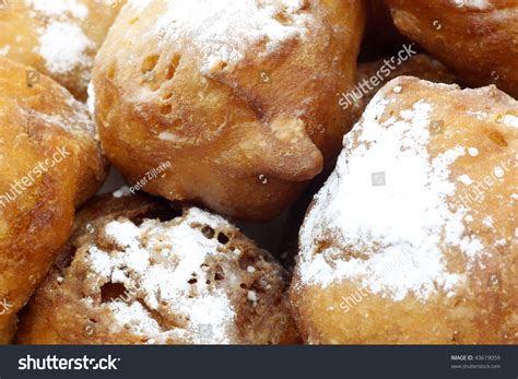 Traditional Dutch Oliebollen With Powdered Sugar Background Stock Photo ...