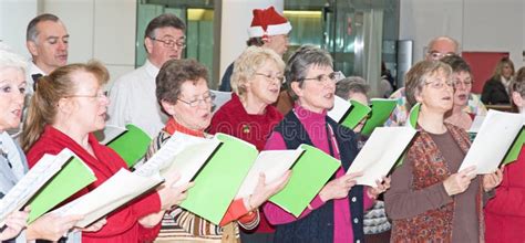 Choir Singing Christmas Carols. Editorial Stock Image - Image of charities, christmas: 22584374