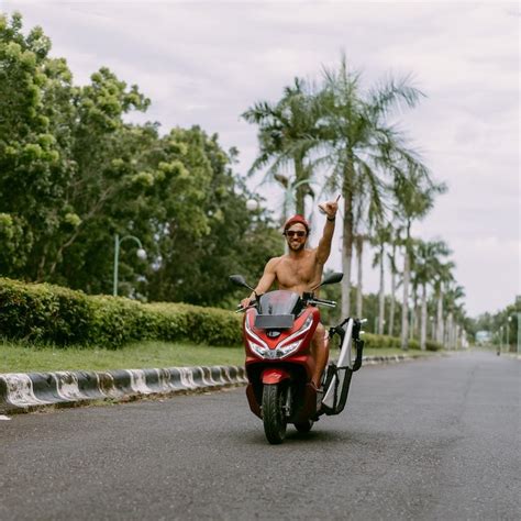 Surfer,Rides,On,Motorbike,With,Surfboard.,Bali,Island,,Indonesia ...