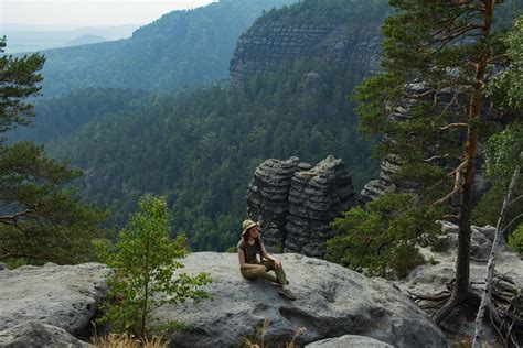 Young woman hiking on the spring meadow, mountains and forest on background 7665963 Stock Photo ...