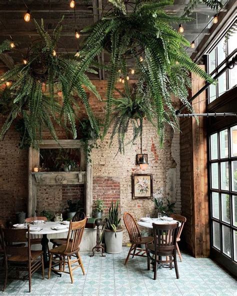 21 Amazing Ways to Decorate With Plants | Rustic cafe, Coffee shop ...