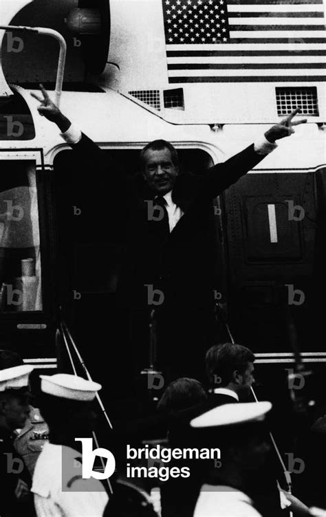 Nixon Presidency. former US President Richard Nixon boarding the Presidential helicopter after ...