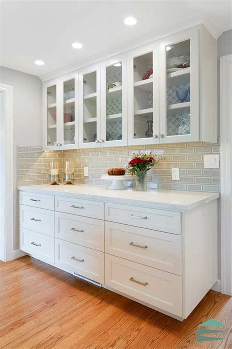 Classic White Cabinets with Glass Front Doors | Glass kitchen cabinet doors, Upper kitchen ...