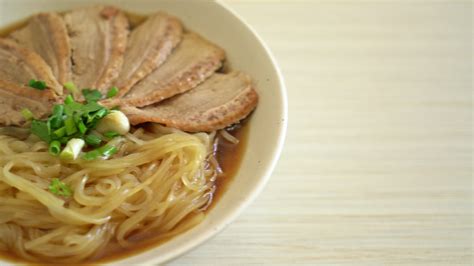 duck noodles with stewed duck soup - Asian food style 10338703 Stock Video at Vecteezy