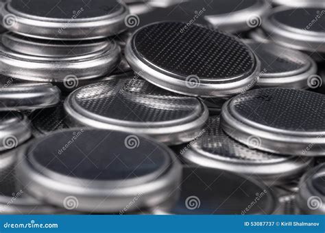 Button cells batteries stock image. Image of heap, electric - 53087737