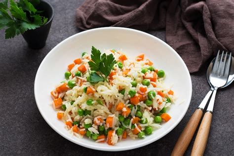 Premium Photo | Boiled rice with vegetables