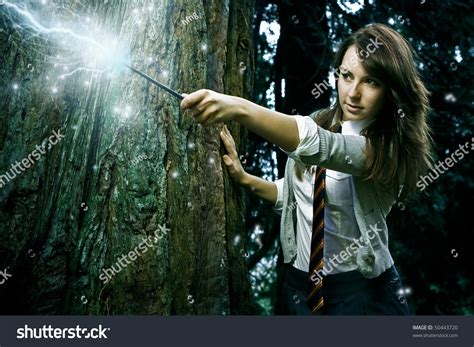 Teenage Wizard Girl With Magic Wand Casting Spells In A Enchanted Fantasy Forest Stock Photo ...