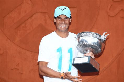 2018 Roland Garros champion Rafael Nadal poses with his trophy in Paris ...